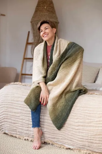 Марина Богун у в'язаному пледі