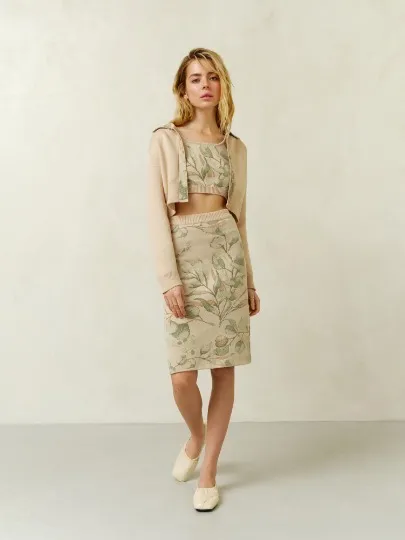 Спідниці міді